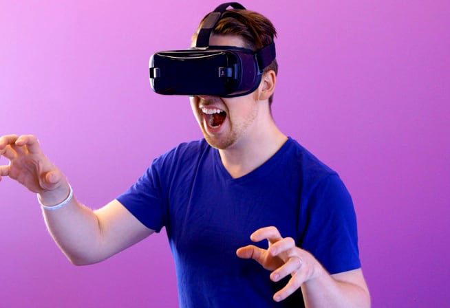 man playing with VR headset